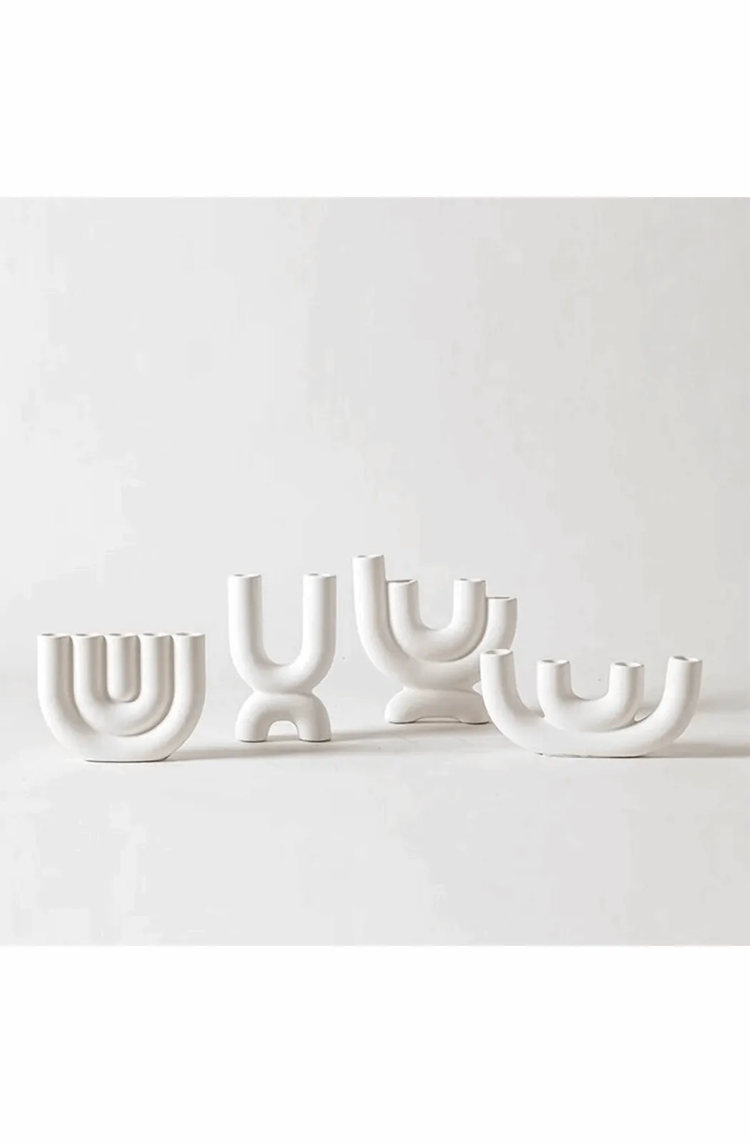 White ceramic candlestick holder